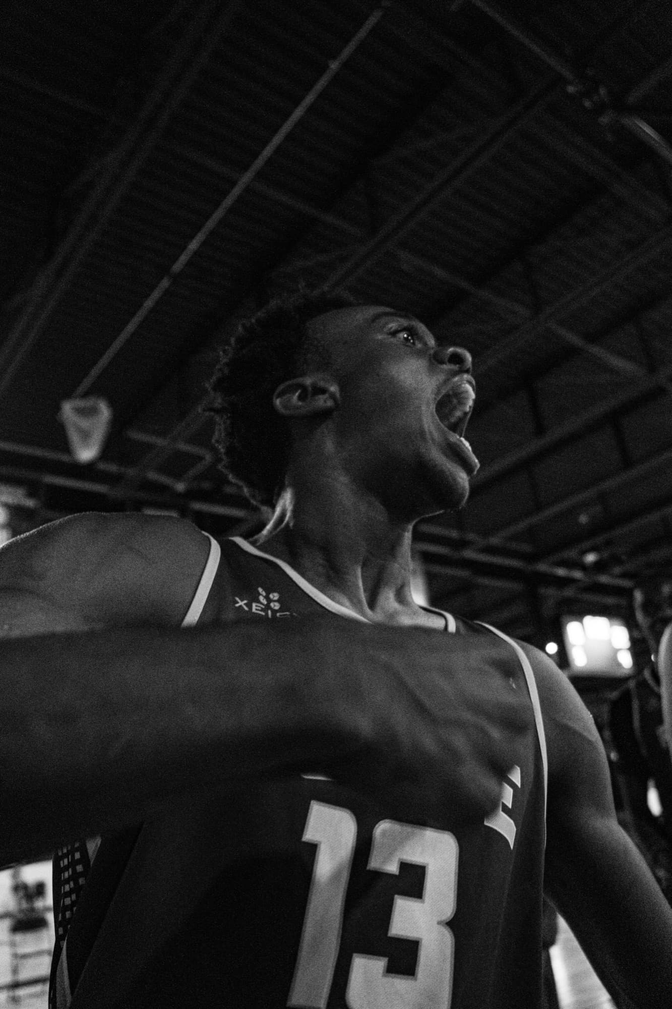 A Yellow Jackets rep player roaring in celebration