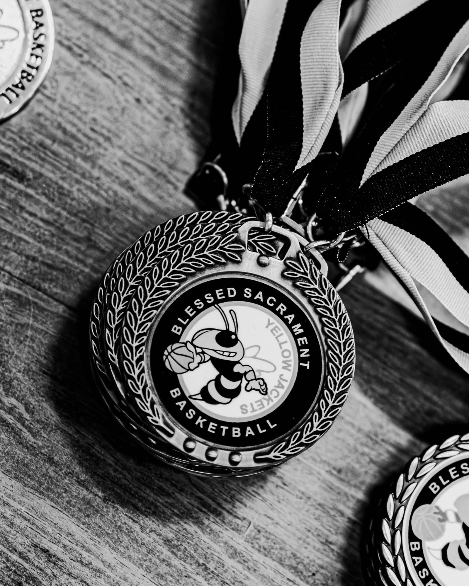 A Blessed Sacrament Yellow Jackets Basketball medal